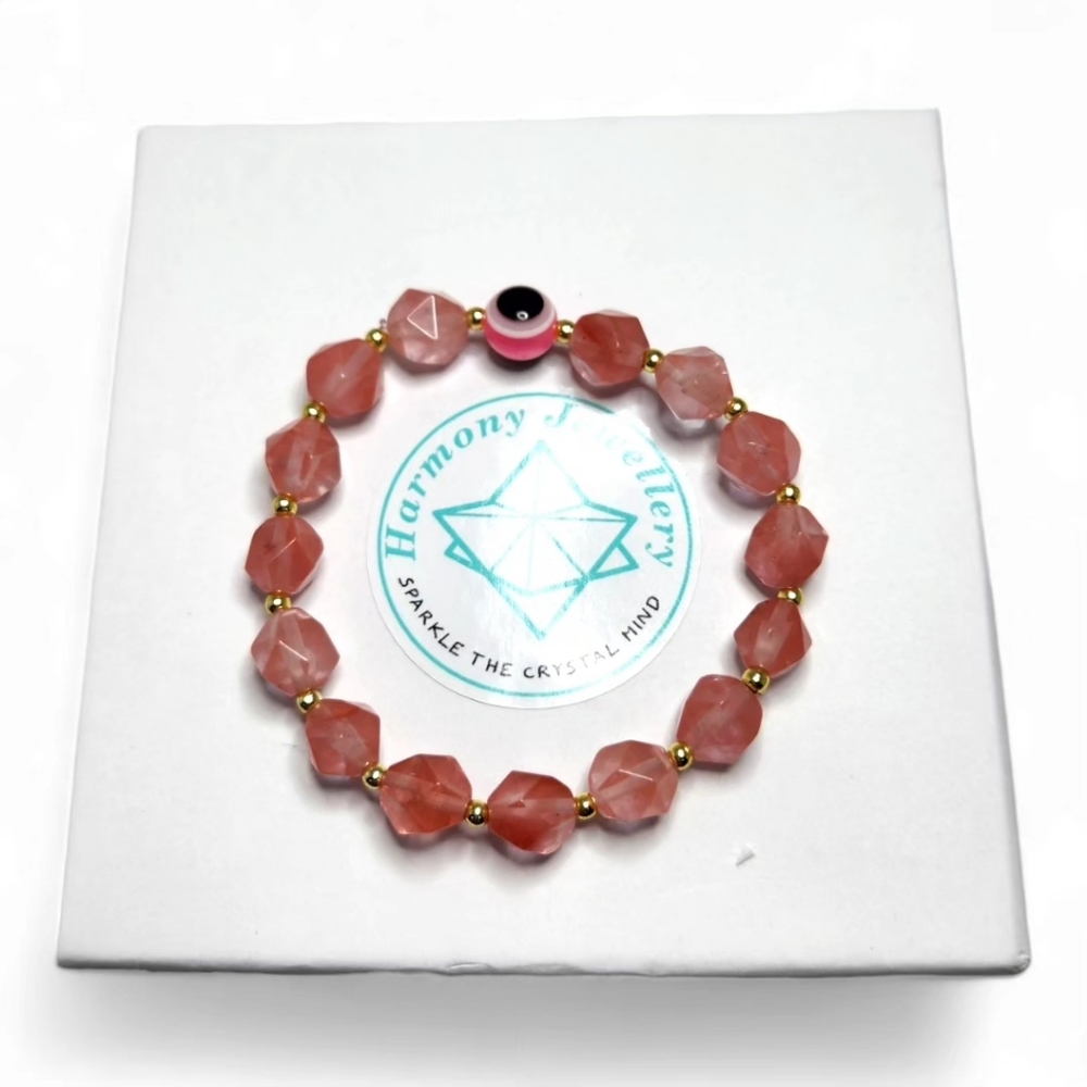 8 mm Faceted Strawberry Quartz bracelet with Evil Eye symbol